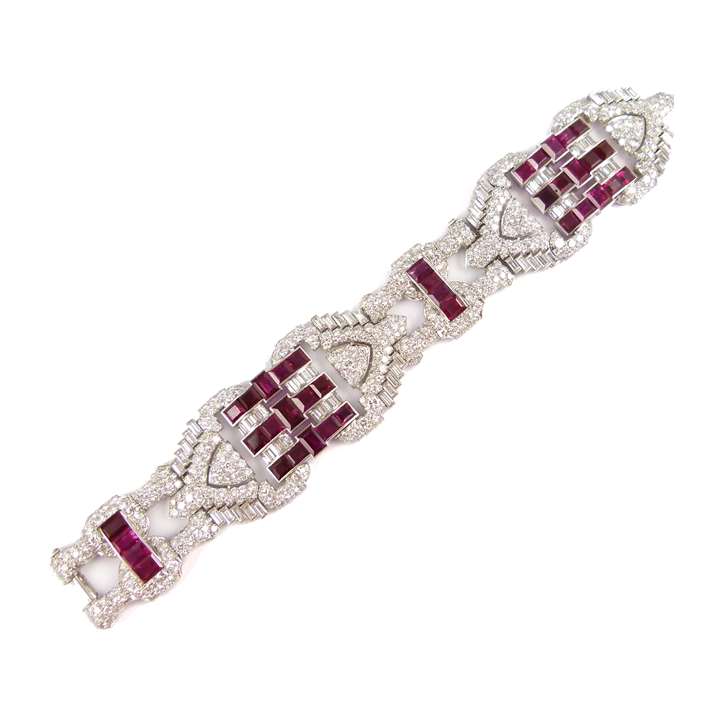 Diamond and Burma ruby geometric bracelet of stylised buckle and strap design,